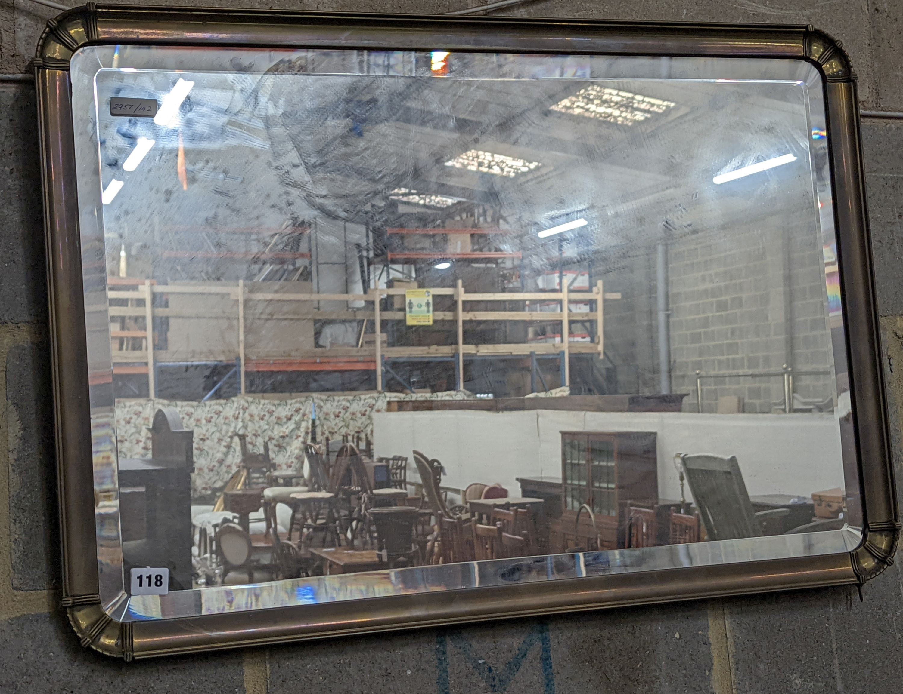 An Edwardian rectangular brass-framed mirror, width 82cm, height 56cm